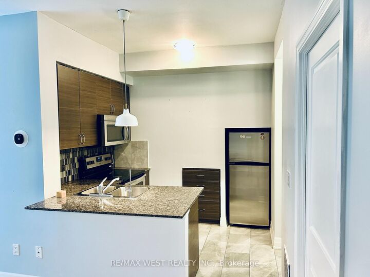 Property Photo: 5 Sousa Mendes Street 102 ON M6P 0A8