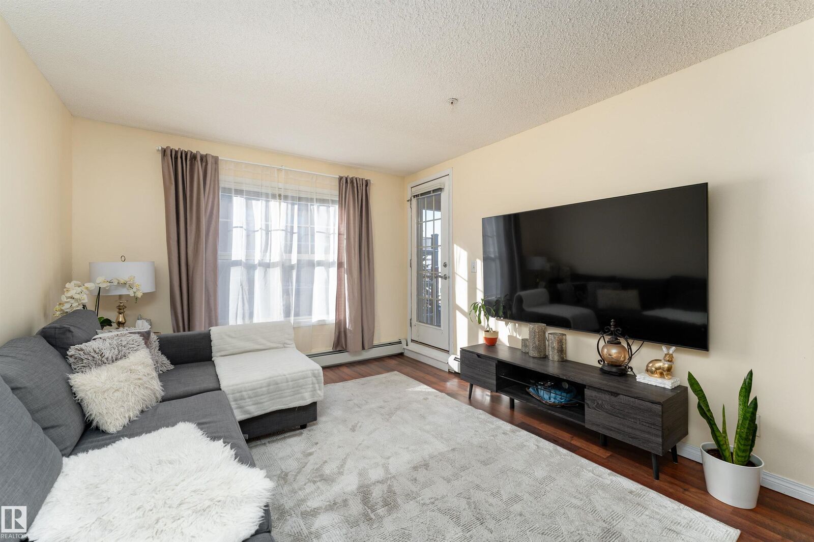 Property Photo: 11441 Ellerslie Road SW 317 AB T6W 1S9