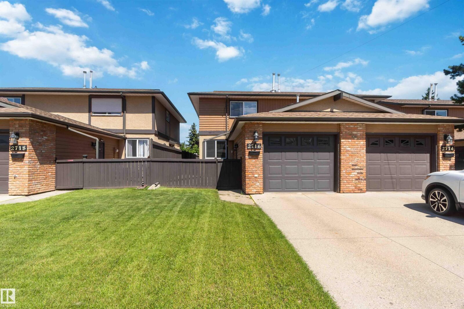 Property Photo: 2716 136A Avenue NW AB T5A 4B6