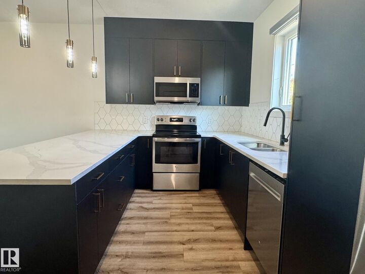 Property Photo: 10125 116 Avenue NW Upper AB T5G 2T5