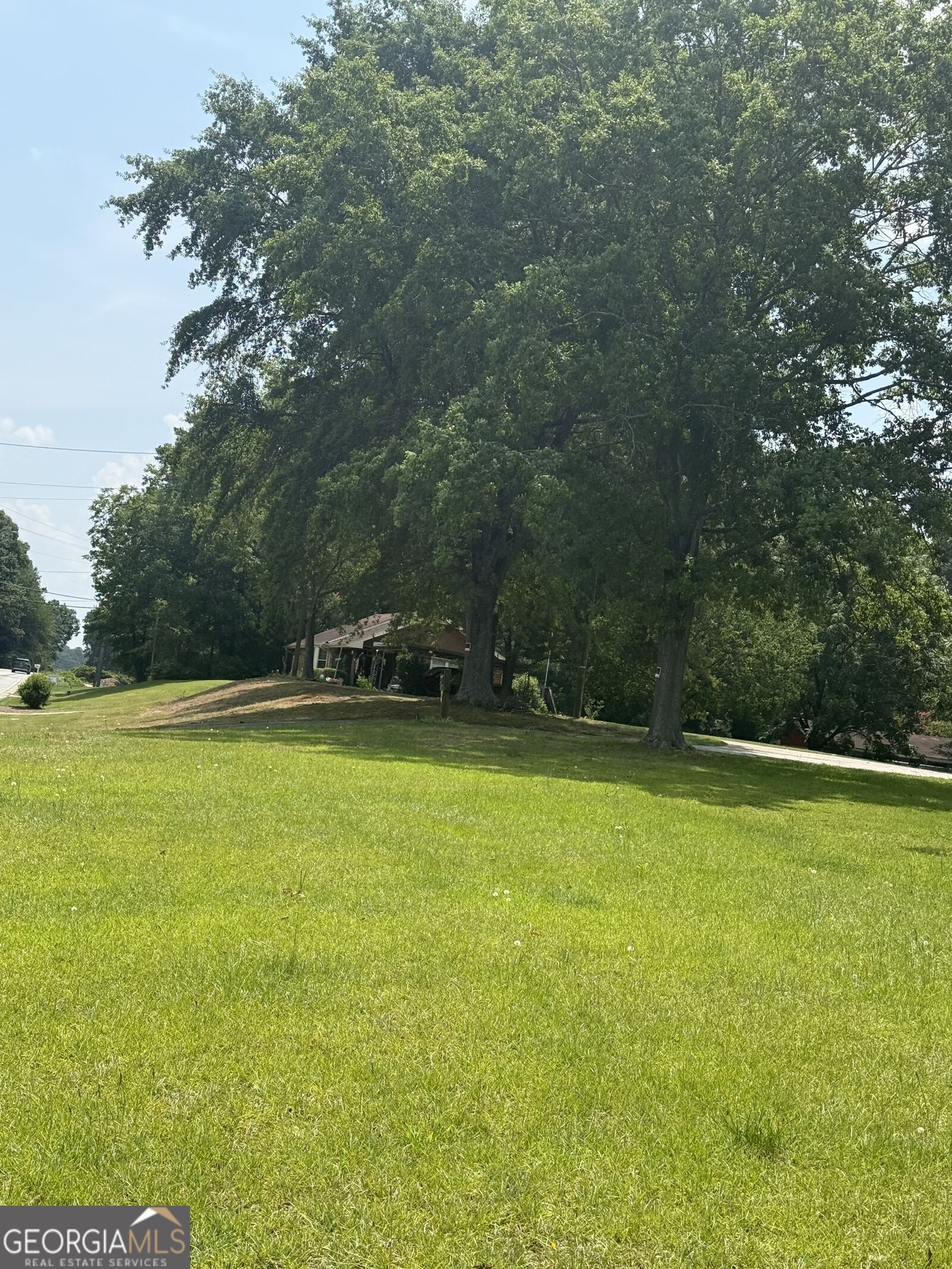 Property Photo:  7359 Pleasant Hill Road  GA 30058 