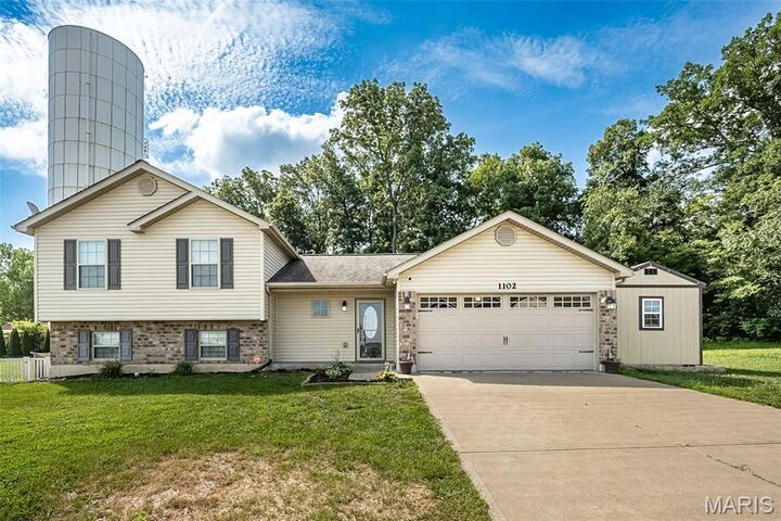 Property Photo:  1102 Marathon Drive  MO 63348 