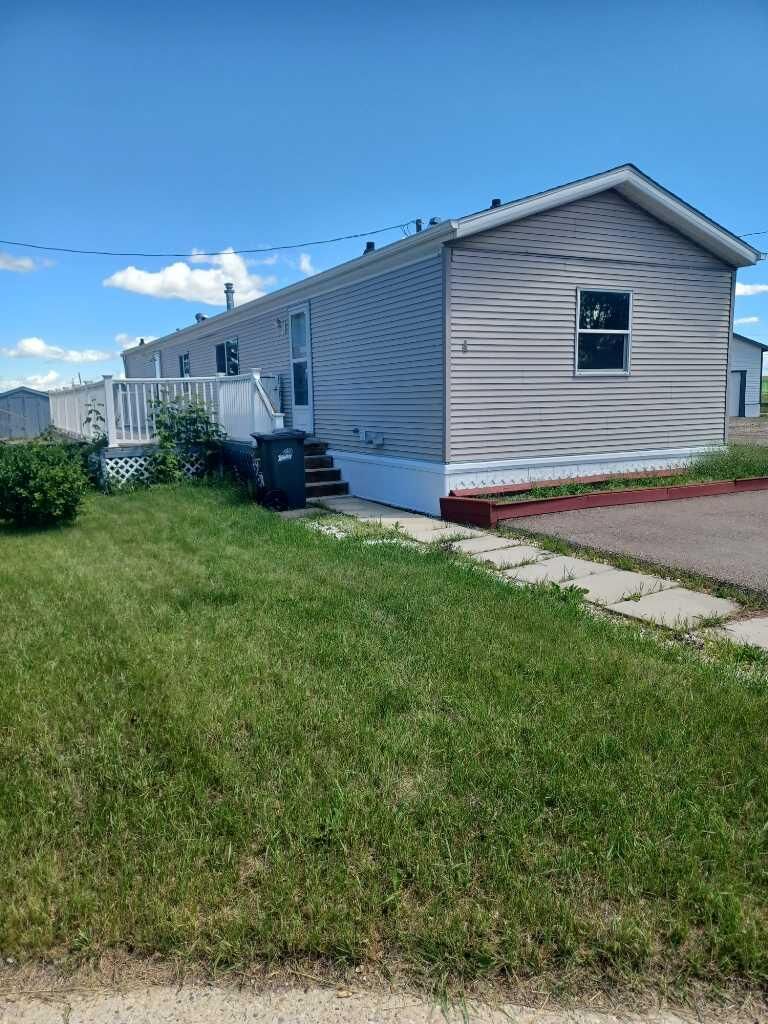 Property Photo: 4506 50 Avenue Unit 4 AB T0C 2J0