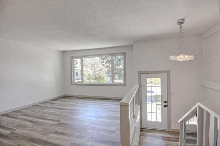Property Photo: 205 Allan Crescent SE AB T2J 0T3