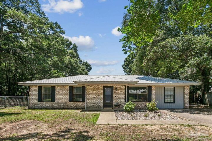 Property Photo:  5389 Camille Gardens Cir  FL 32570 
