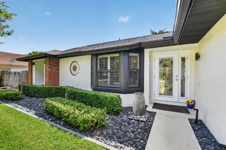 Property Photo:  294 NW 42nd Way  FL 33442 