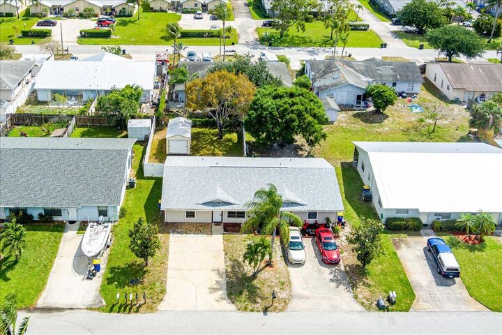Property Photo:  8997 SE Sandy Lane  FL 33455 