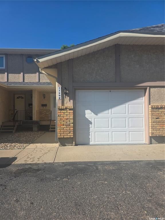 Property Photo:  1159 Taisey Crescent B  SK S4A 2S8 