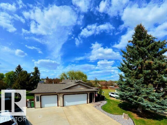 Property Photo: 4118 46 Street AB T4X 1G1