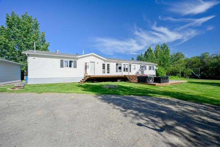Property Photo:  712003 Range Road 64  AB T8W 5B8 