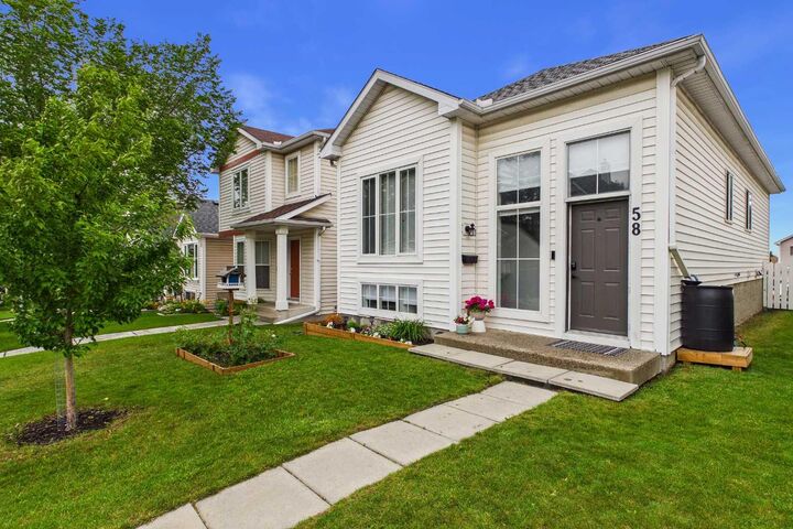 Property Photo: 58 Hidden Crescent NW AB T3A 5L4