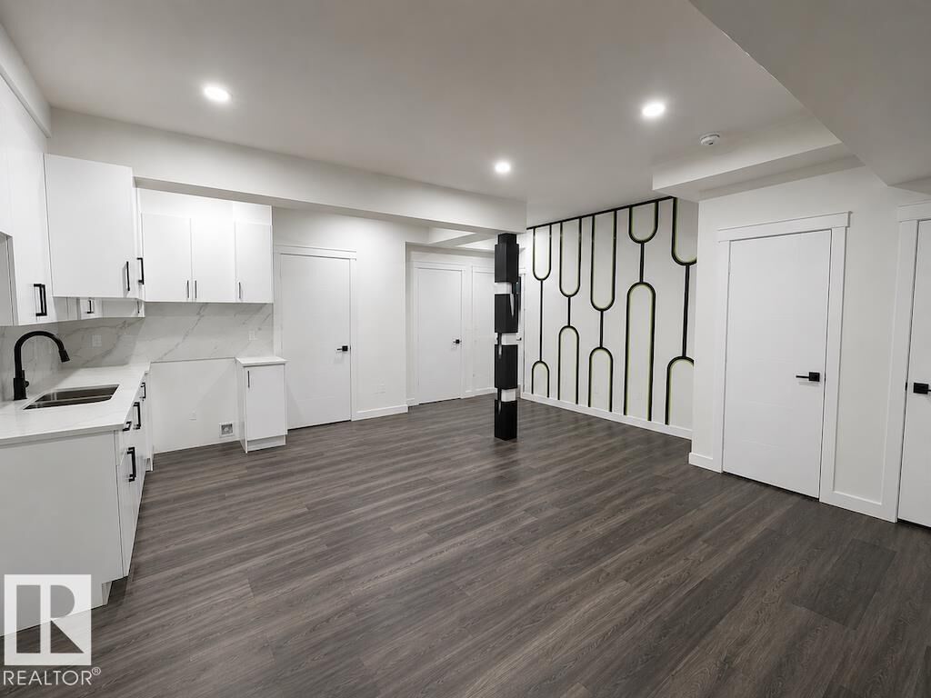 Property Photo: 319 33 Avenue NW Bsmt AB T6T 2S9