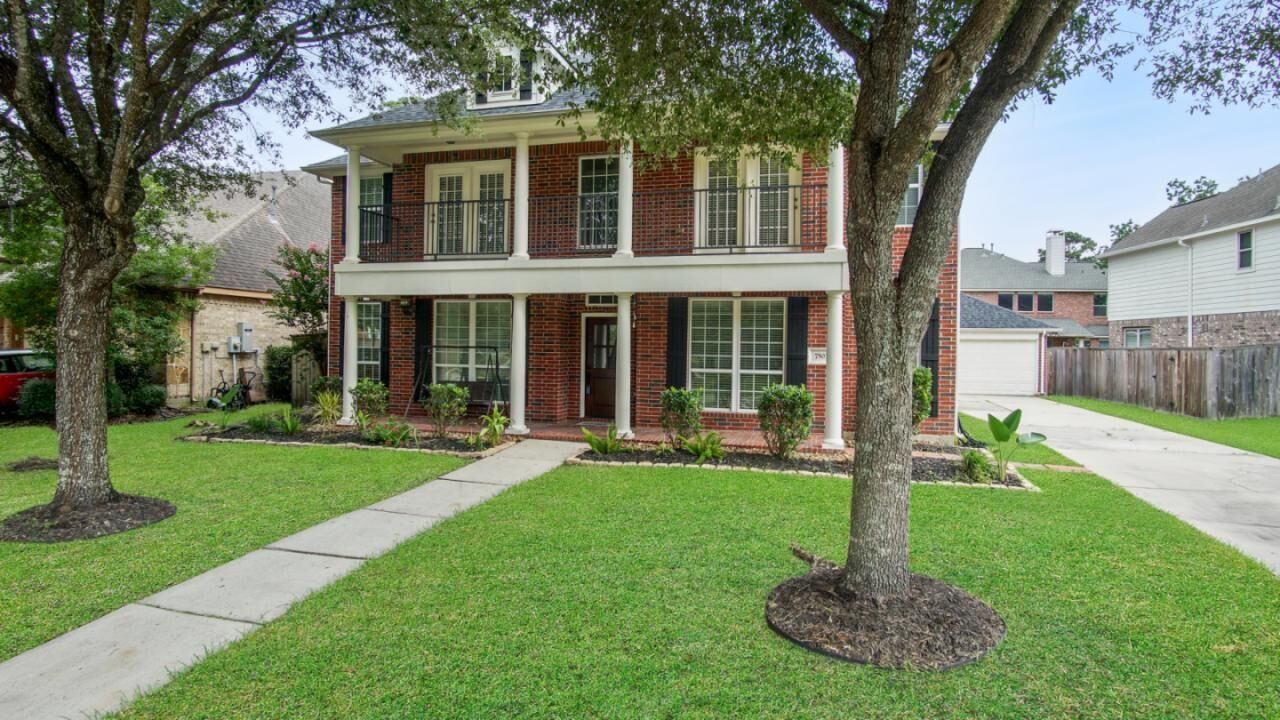 Property Photo: 7503 Stonebridge Creek Lane TX 77396