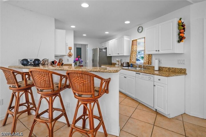 Property Photo: 2 E Greens Circle FL 33936