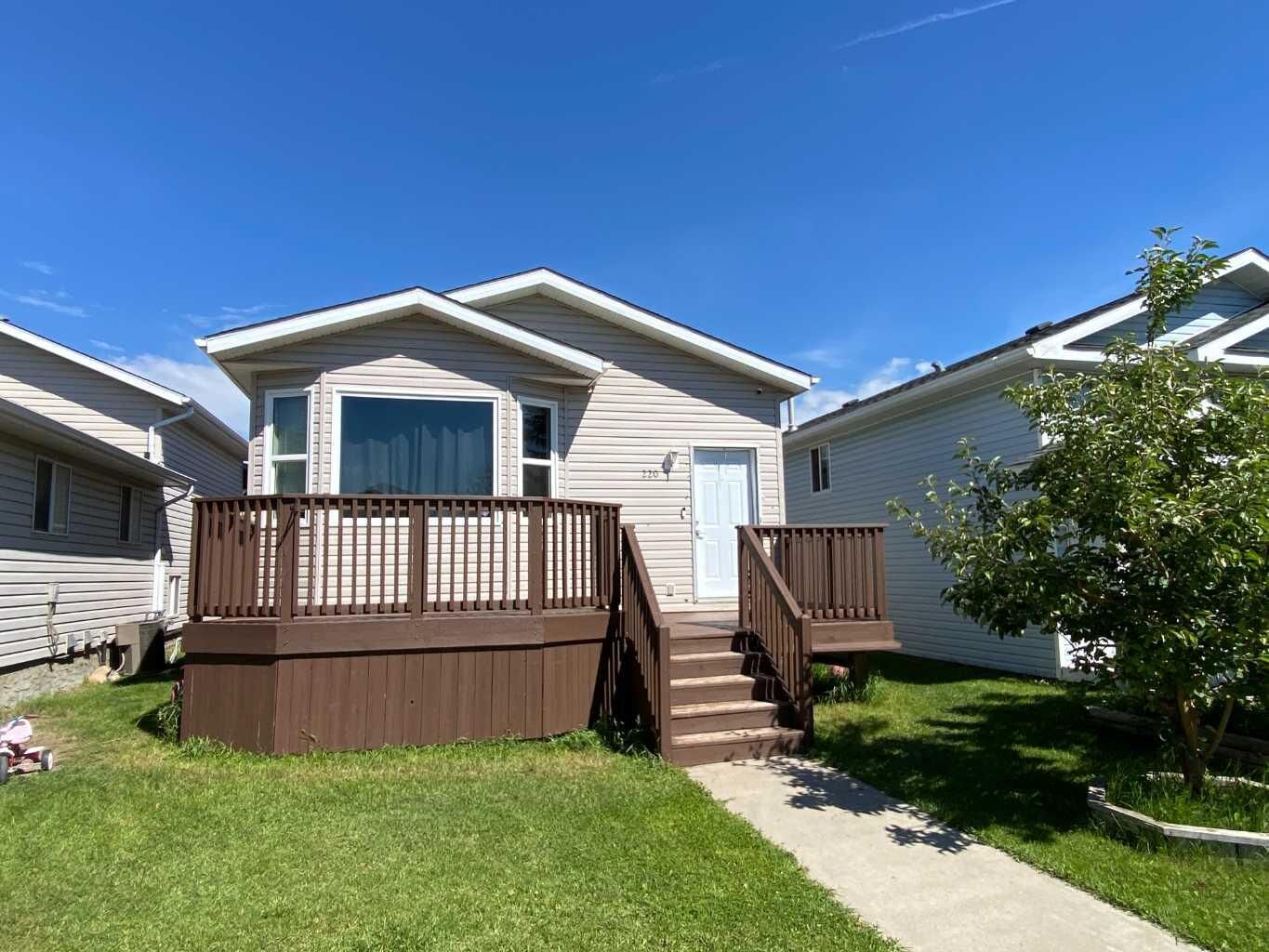 Property Photo:  220 16 Street E  AB T1R 1K3 