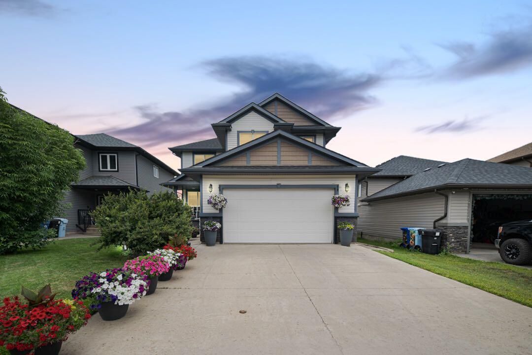 Property Photo: 188 Merganser Crescent AB T9K 0P1
