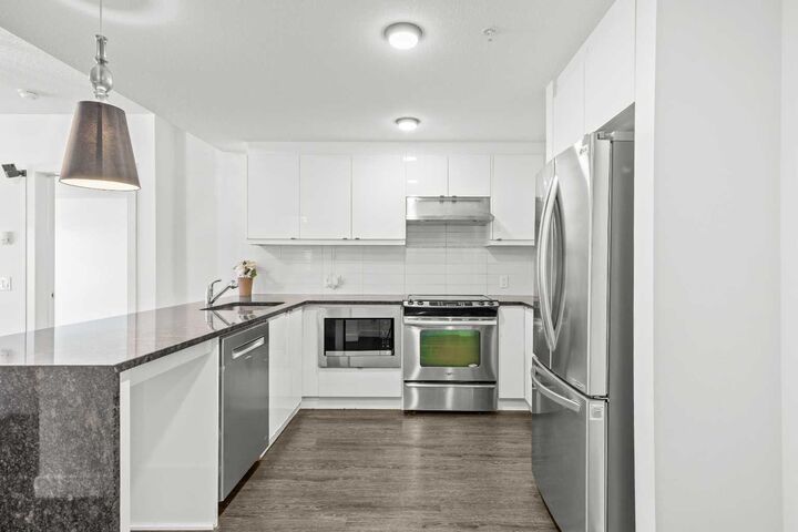 Property Photo: 25 Aspenmont Heights SW 103 AB T3H 0E4