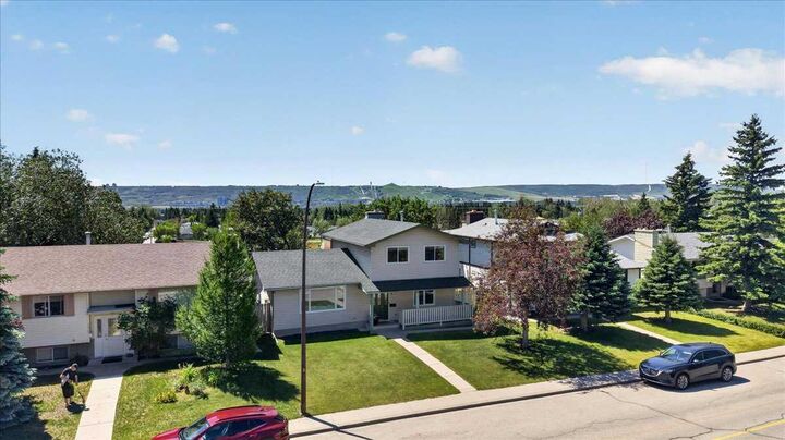 Property Photo: 7327 Silver Springs Road NW AB T3B 3X1