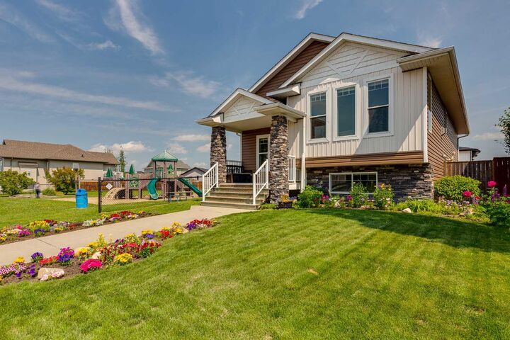 Property Photo:  74 Mackenzie Crescent  AB T4L 0B3 