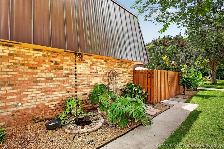 Property Photo:  5708 SE Windsong Lane  FL 34997 