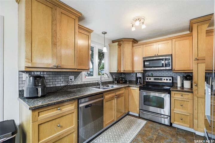 Property Photo: 251 Sangster Boulevard SK S4R 7H2
