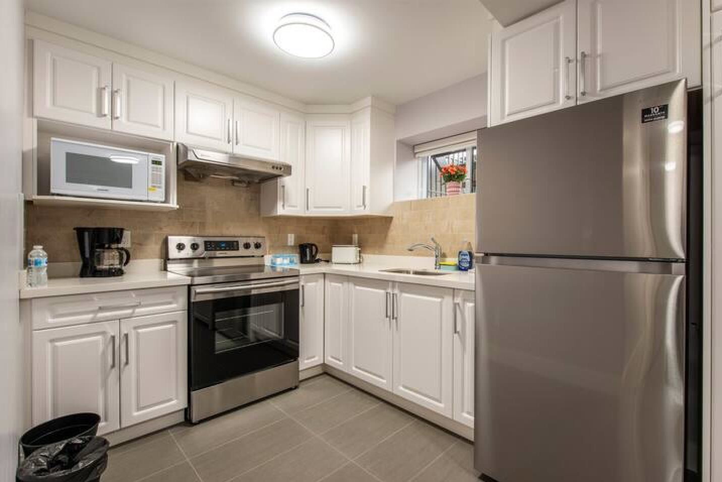 Property Photo:  100 E 48th Avenue  BC V5W 2C8 