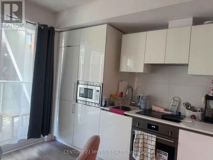 Property Photo: 230 Simcoe Street 1636 ON M5T 1T4
