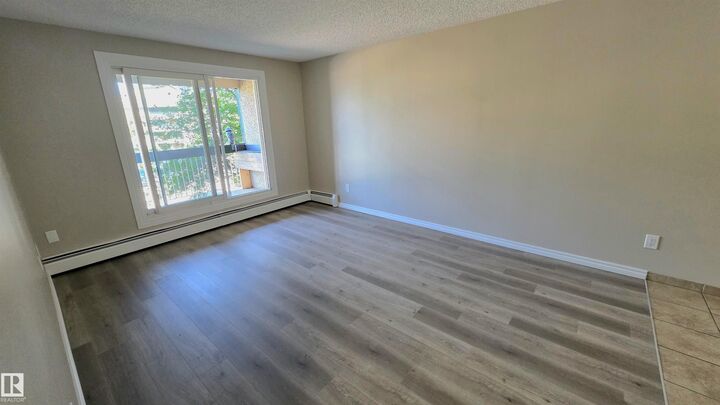 Property Photo:  4810 Mill Woods South Road NW 205  AB T6L 5N9 