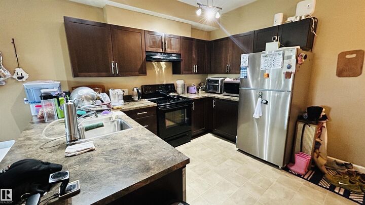 Property Photo: 5302 51 Street 211 AB T9N 2E3
