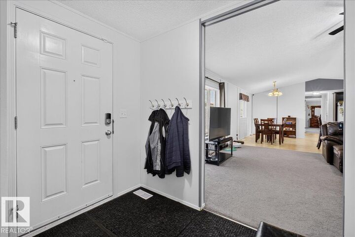Property Photo: 1073 Aspen Drive East AB T9E 8R1