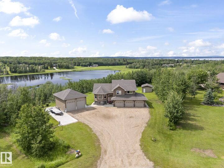 Property Photo:  61130 465 Rge Road  AB T9N 2G9 