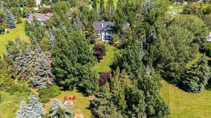 Property Photo: 80107 Highwood Meadows Drive E AB T1S 4Y9