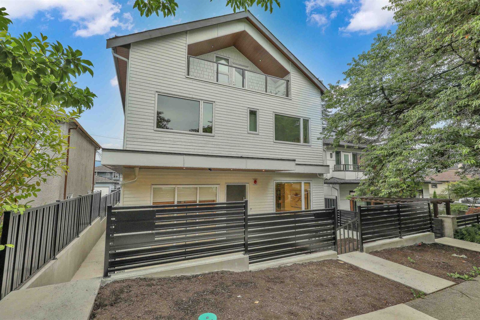 Property Photo: 3185 Graveley Street 1 BC V5K 3K7
