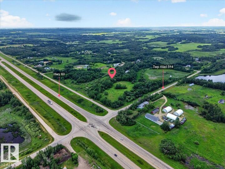 Property Photo:  51401 Hghway 60 4  AB T7Y 1C3 