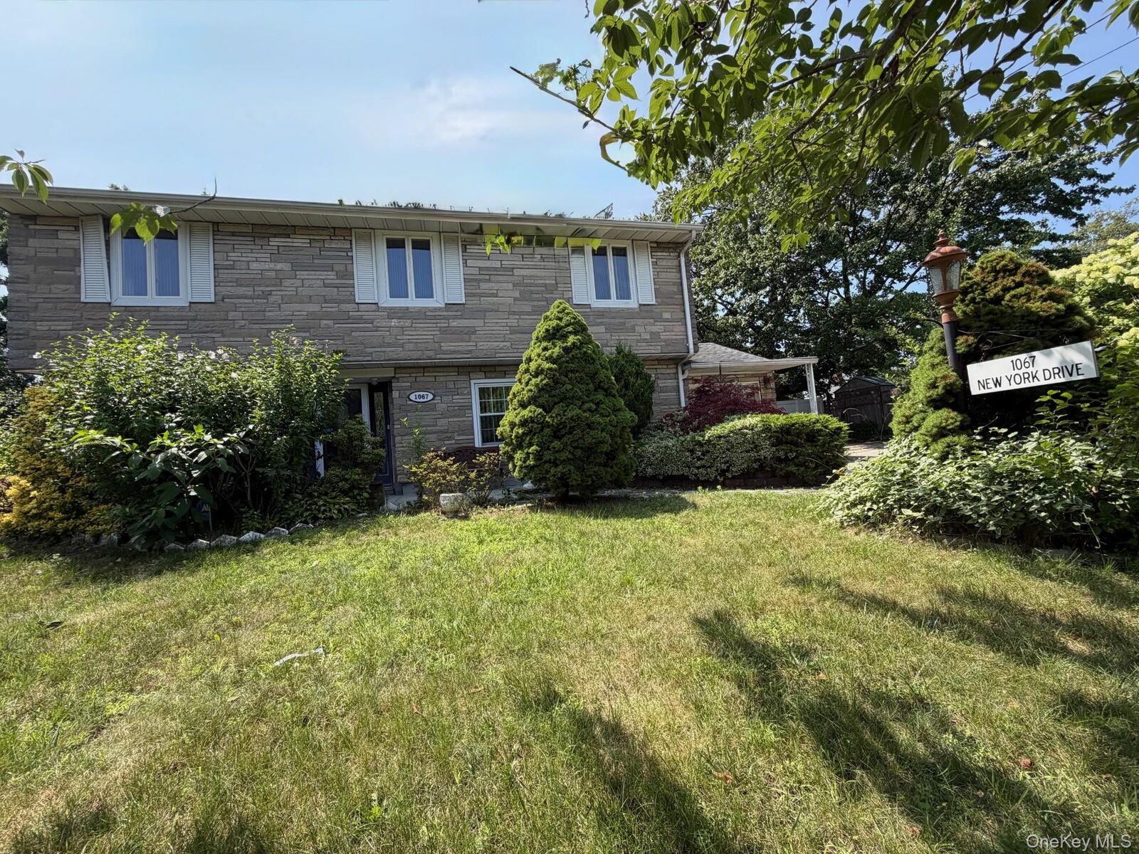 Property Photo:  1067 N New York Drive  NY 11758 