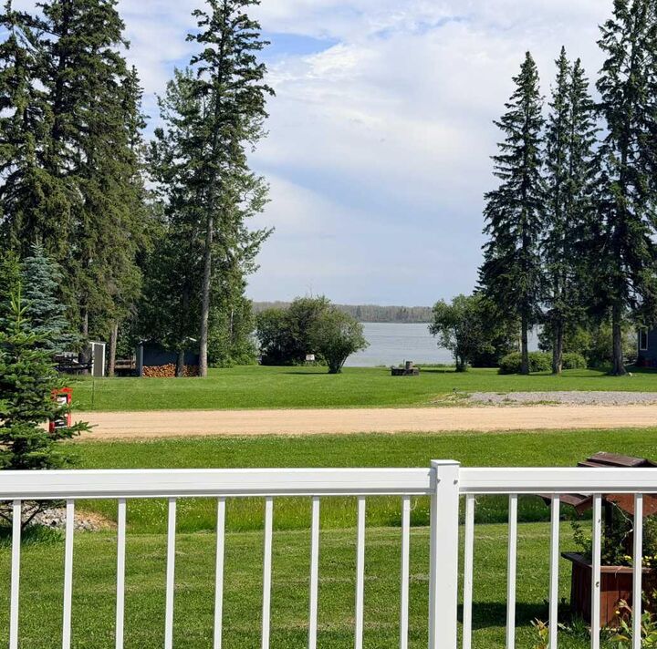 Property Photo:  272 465015 Rr63a Range  AB T0C 0C0 