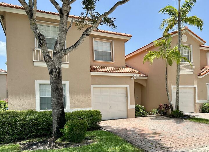 Property Photo: 639 NW 130th Way FL 33028