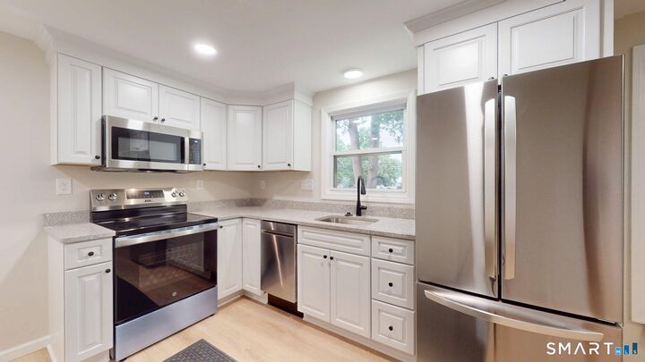 Property Photo:  16 Arrow Street  CT 06082 