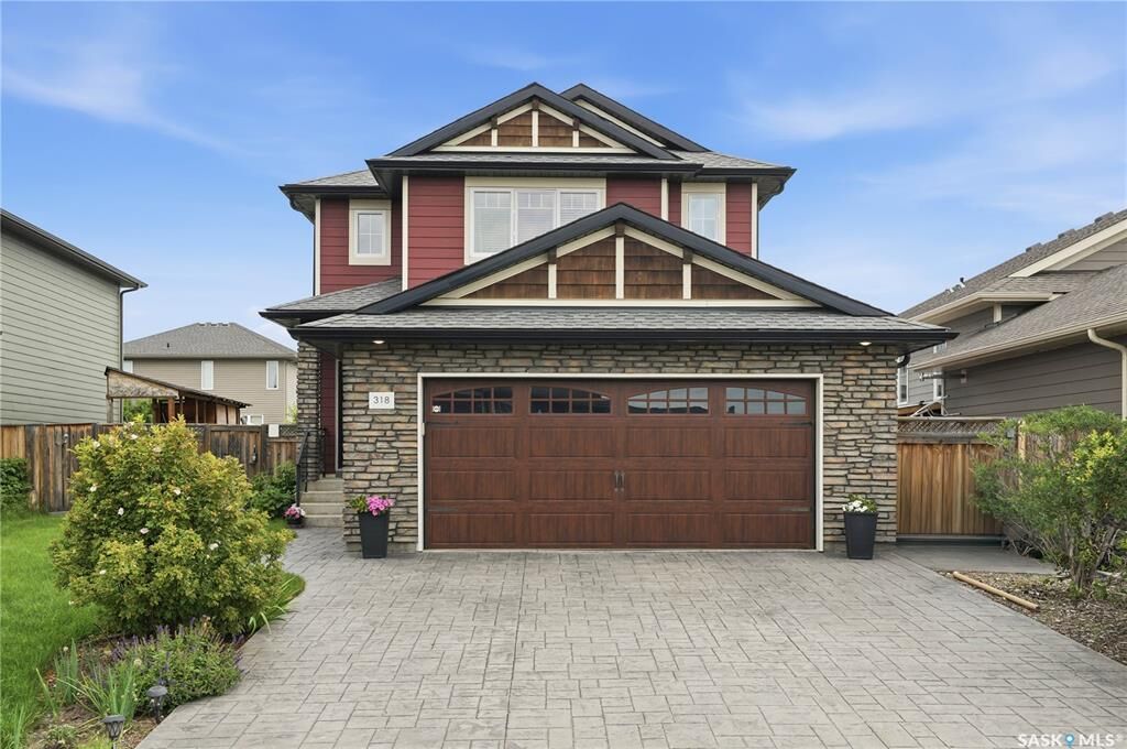 Property Photo: 318 Chubb Cove SK S7T 0E6