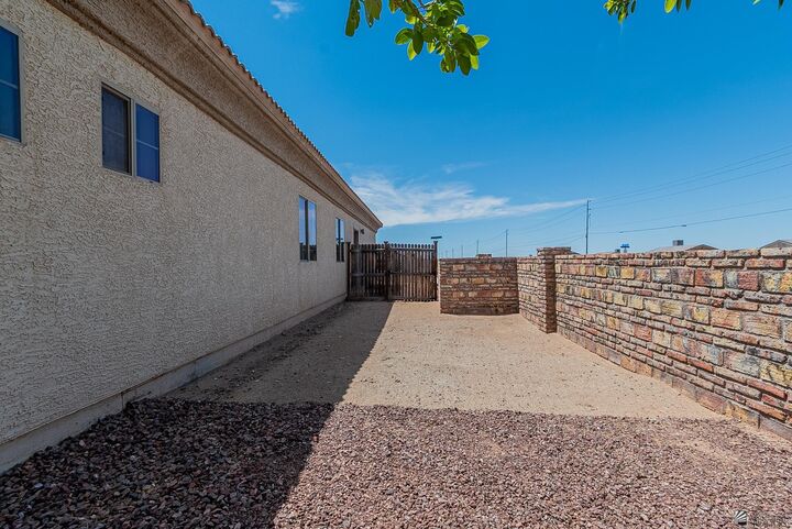 Property Photo: 10112 E 36 St AZ 85365