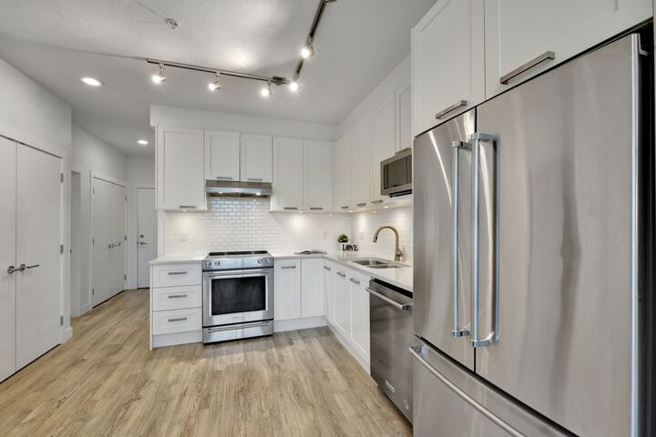 Property Photo:  5638 201A Street 317  BC V3A 0L8 