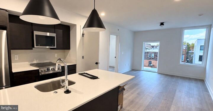 Property Photo:  5200 Chester Avenue 10 408  PA 19143 