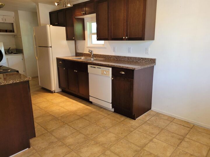 Property Photo:  31313 Livingstone Avenue 1  BC V2S 3M7 