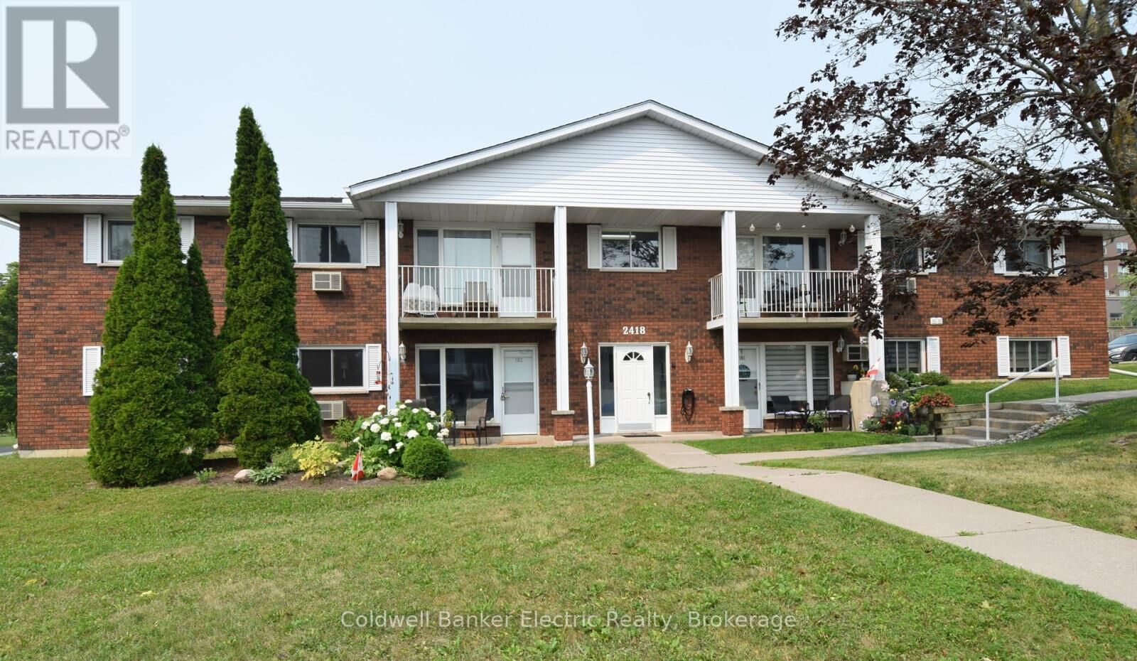 Property Photo:  2418 Mountland Drive 104  ON K9K 2E2 