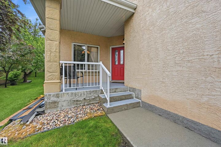 Property Photo: 577 Butterworth Way NW 1 AB T6R 2Y2