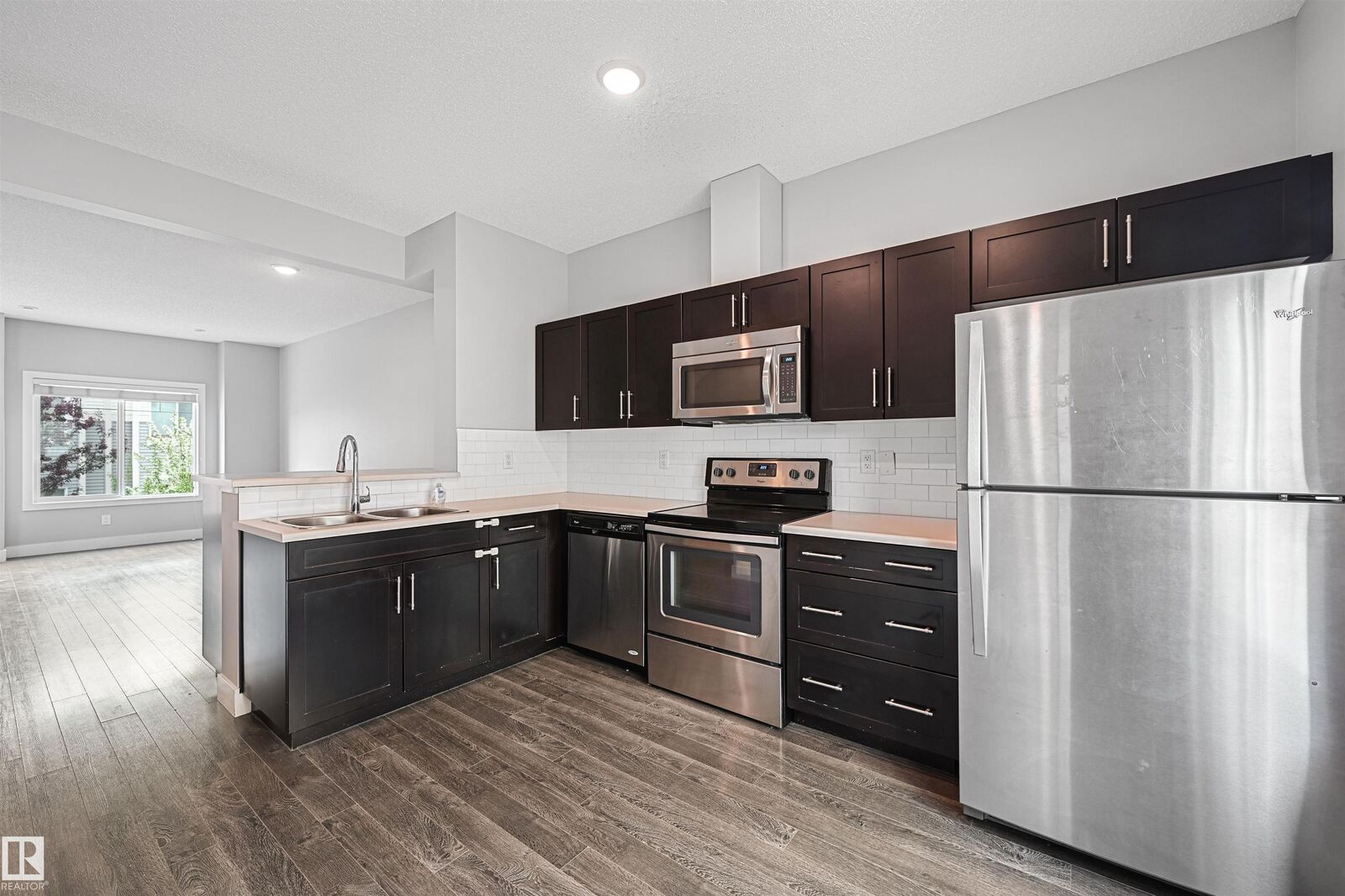 Property Photo: 804 Welsh Drive SW 102 AB T6X 1Y8
