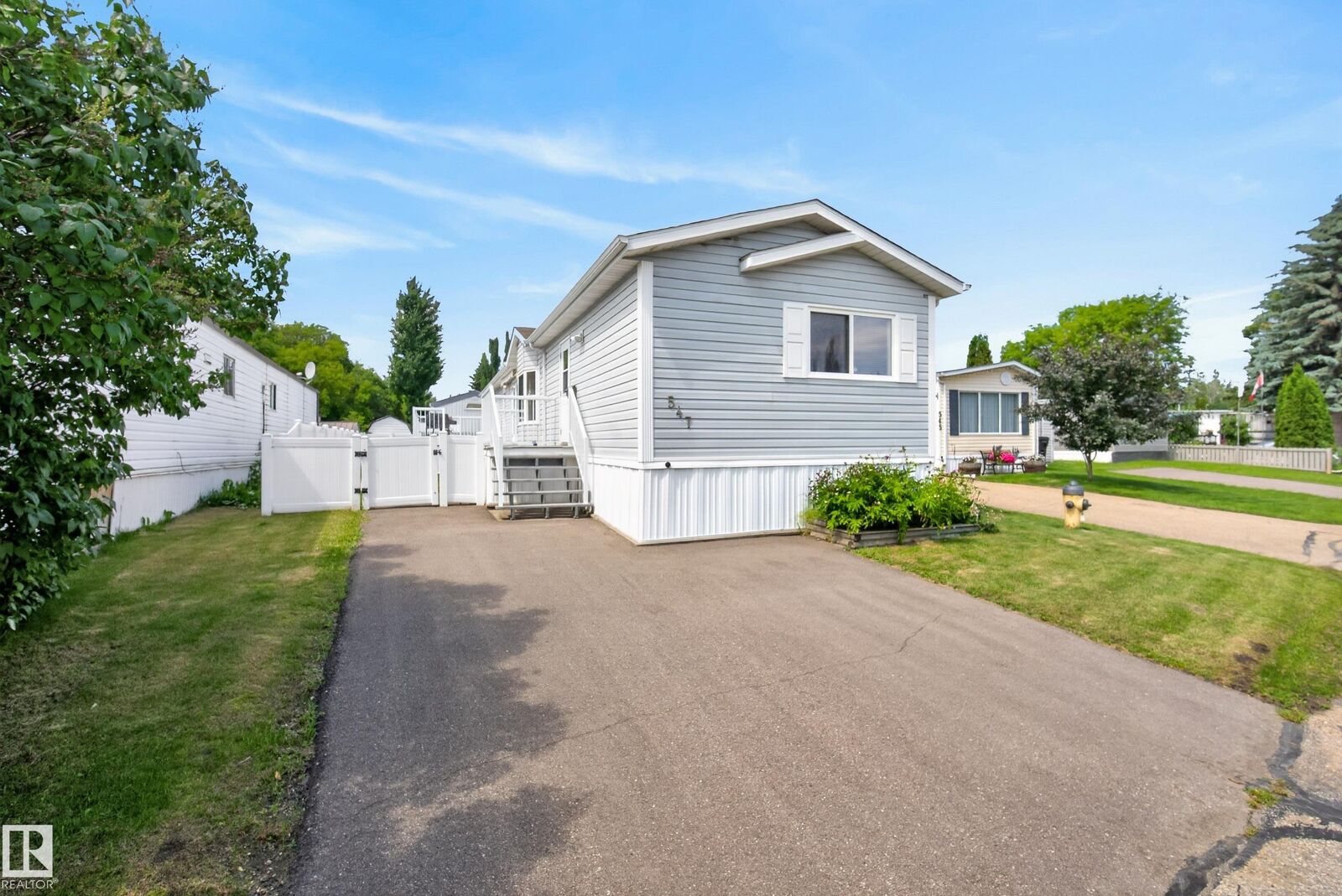 Property Photo: 547 Evergreen Park NW AB T5Y 4M2
