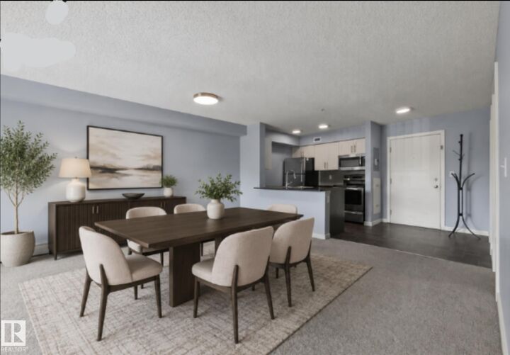 Property Photo: 12045 22 Avenue SW 217 AB T6W 2Y2