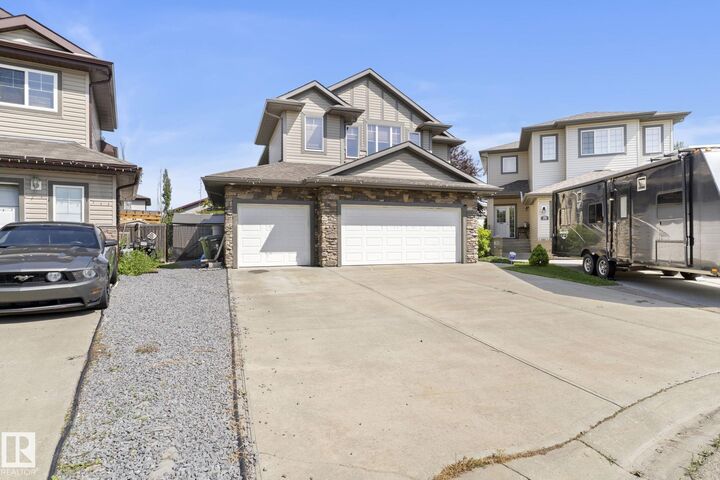 Property Photo: 25 Hilltop Ridge AB T8L 0E4