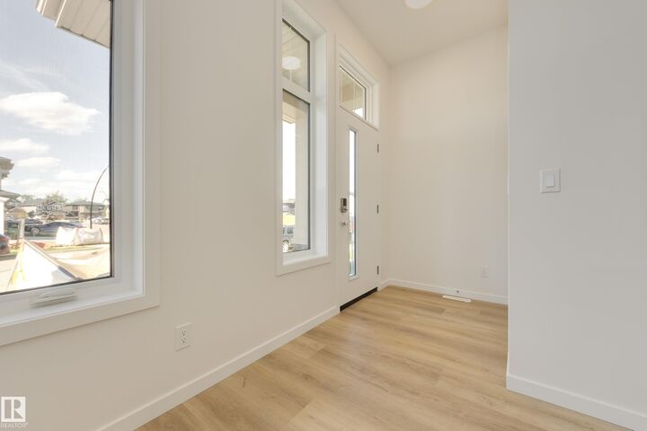 Property Photo:  21007 25 Avenue NW  AB T6M 2M7 
